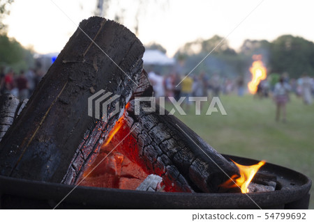 Wood with hot orange flames in a close up view Wood with hot orange flames in a close up view 54799692