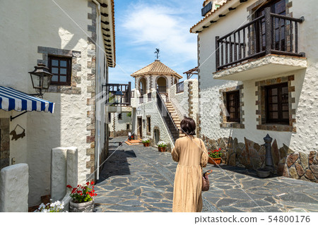 Castilian cityscape and woman Castilian cityscape and woman 54800176