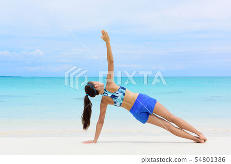 Fitness woman strength training core side plank Fitness woman strength training core side plank 54801386
