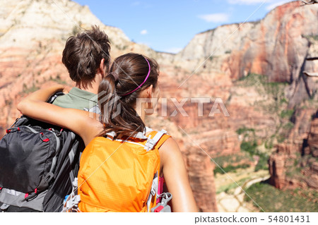 Hiking - hikers looking at view Zion National park 54801431