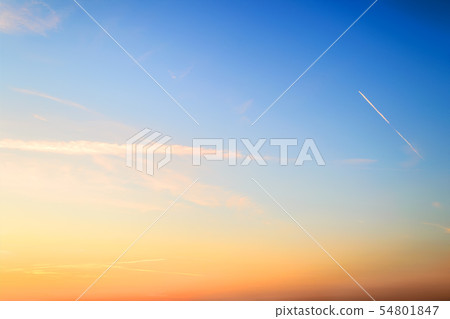 Blue and orange colored sky just before sunrise 54801847