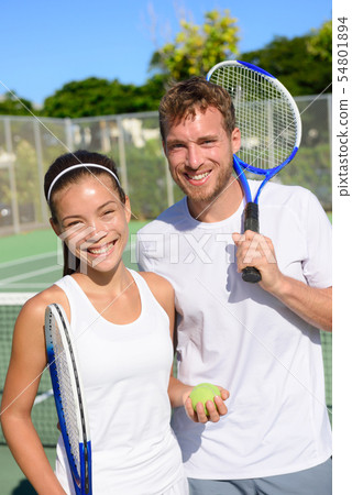 Tennis sport - Mixed doubles couple players Tennis sport - Mixed doubles couple players 54801894