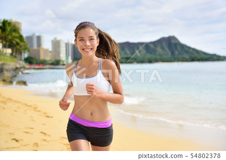 Running sport fitness woman jogging on beach run 54802378