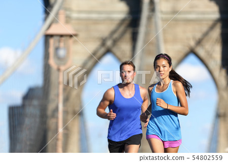 Urban runners running people in New York City NYC Urban runners running people in New York City NYC 54802559