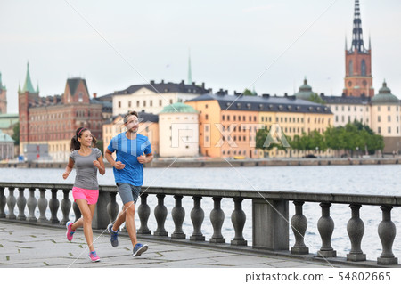 Fit exercise people running in Stockholm, Sweden Fit exercise people running in Stockholm, Sweden 54802665