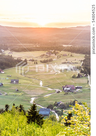 Jizerka village at sunset time. View from Bukovec Mountain, Jizera Mountains, Czech Republic 54804525