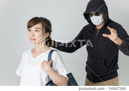 Suspicious men and women 54807360