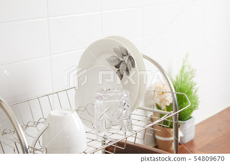 Kitchen with various kitchen tools, kitchen lathe and plants background. Dry dish and bowl shaped. Kitchen with various kitchen tools, kitchen lathe and plants background. Dry dish and bowl shaped. 54809670