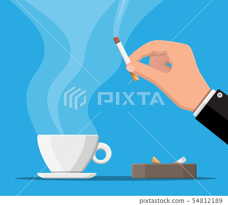 Coffee cup and ashtray full of smokes cigarettes. 54812189