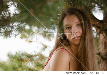 young woman in red dress nature fresh air young woman in red dress nature fresh air 54818138