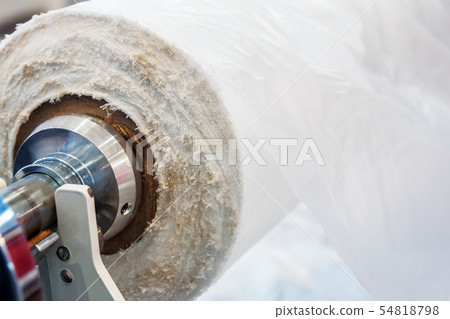 roll with cellophane in a shop or factory 54818798