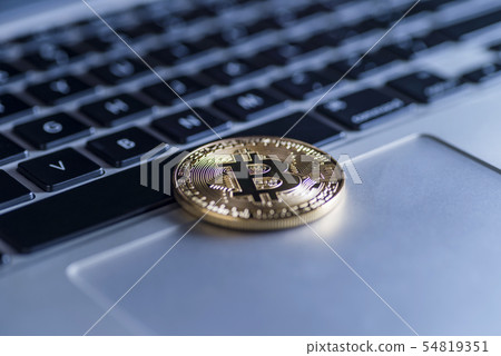 Image of virtual currency on laptop Image of virtual currency on laptop 54819351