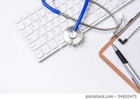 Stethoscope keyboard clipboard medical top view flatlay stethoscope layout long-term care 54820475