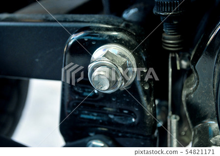 The nut secures the motorcycle chassis. The nut secures the motorcycle chassis. 54821171