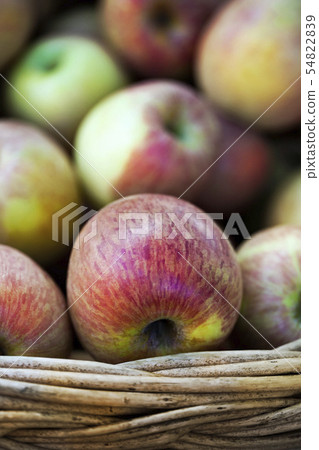 Apples on a basket Apples on a basket 54822839