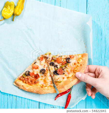 Image of pizza on table. Man take slice. Image of pizza on table. Man take slice. 54822841