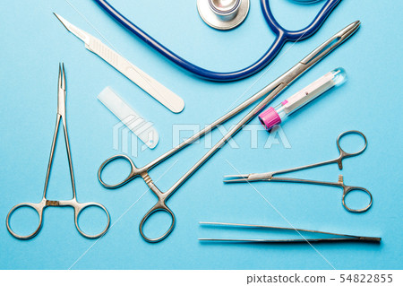 Doctor tools on blue surface. Doctor tools on blue surface. 54822855