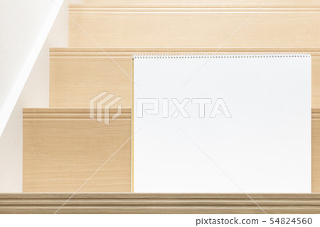 Sketchbook placed on the stairs 54824560