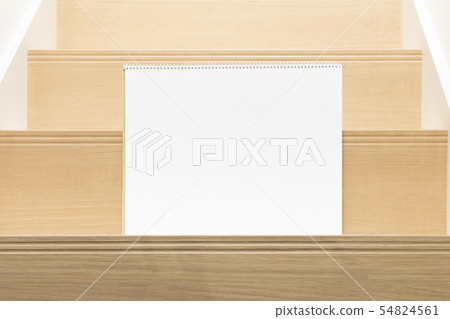 Sketchbook placed on the stairs 54824561