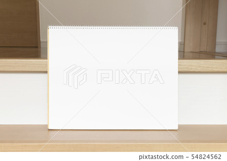 Sketchbook placed on the stairs 54824562