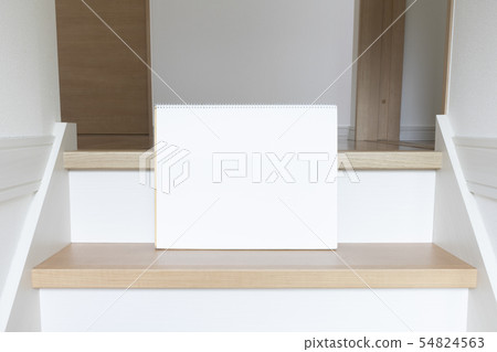 Sketchbook placed on the stairs 54824563