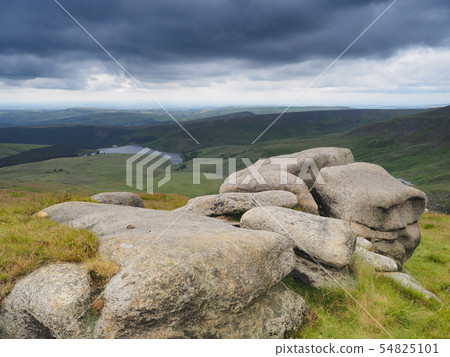 Overlooking Kinder Reservoir on the Pennine Way with dark storm clouds overhead, Peak District, UK Overlooking Kinder Reservoir on the Pennine Way with dark storm clouds overhead, Peak District, UK 54825101