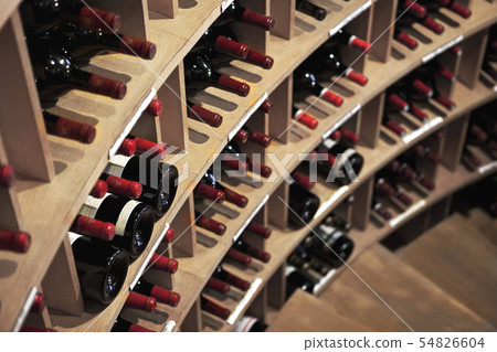 Downstairs and wine bottles in a winery 54826604