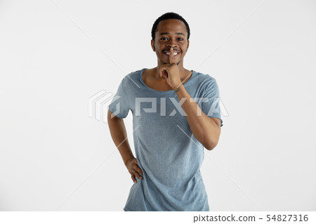 Portrait of young man isolated on white studio background Portrait of young man isolated on white studio background 54827316