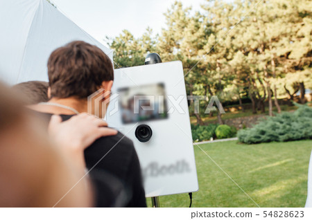 photo booth for instant photos at an outdoor wedding photo booth for instant photos at an outdoor wedding 54828623