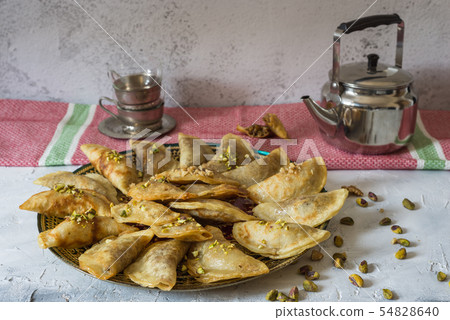 Arabic Traditional dessert Qatayef or Atayef  54828640