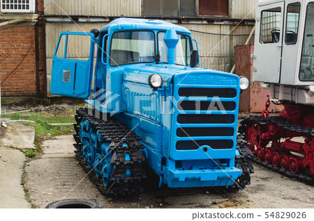 exhibition of old and modern tractors in the 54829026