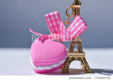 Souvenir golden eiffel tower with a purple heart Souvenir golden eiffel tower with a purple heart 54829720