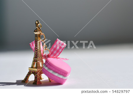 Souvenir golden eiffel tower with a purple heart Souvenir golden eiffel tower with a purple heart 54829797