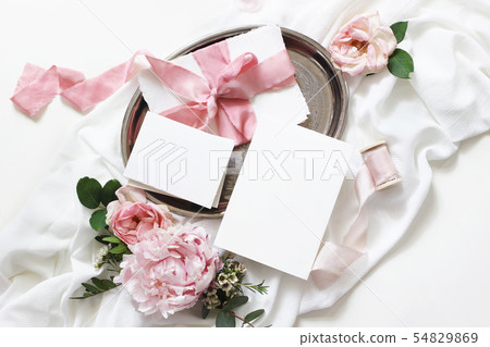 Feminine wedding, birthday mock-up scene. Blank paper greeting cards, envelope, eucalyptus, pink 54829869
