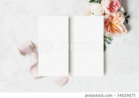 Wedding, birthday stationery mock-up scene. Blank menu cards. Decorative floral corner. Green leaves 54829875