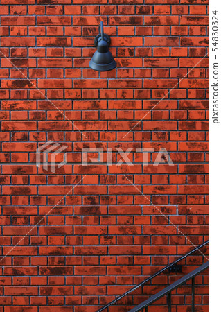 Retro light mounted on brick wall Retro light mounted on brick wall 54830324