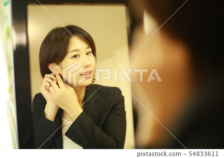 Women preparing for work Women preparing for work 54833611