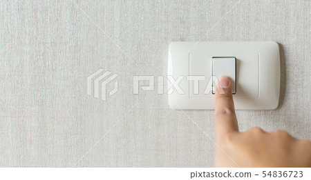 Concept save energy. Hand turning off switch 54836723