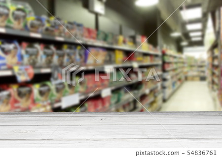 Empty White wood table supermarket blur for Empty White wood table supermarket blur for 54836761