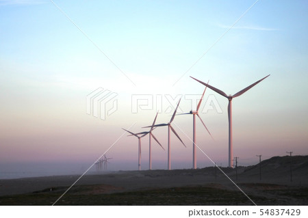 Windmill and sunset coast Windmill and sunset coast 54837429