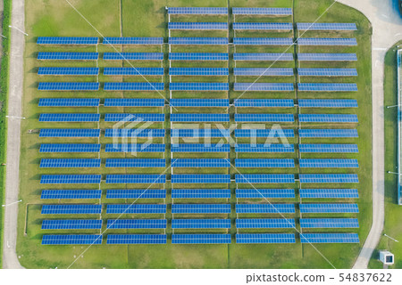 Aerial view of Solar Panels Farm with sunlight. 54837622