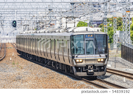 Commuter train running image 54839192