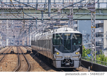 Commuter train running image 54840107