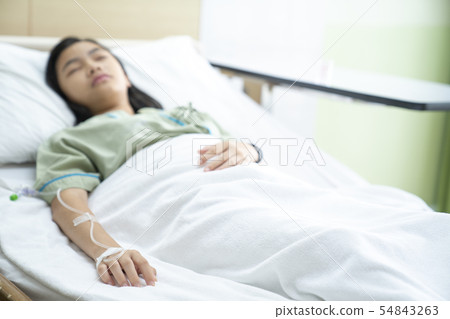 Asian lady sleep and patient in hospita 54843263