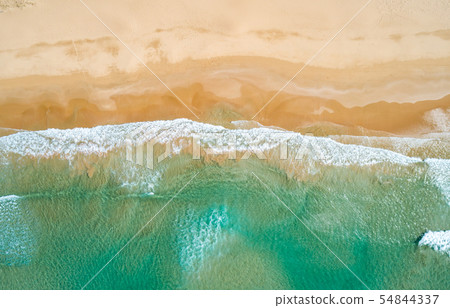 Aerial view to tropical sandy beach and blue ocean Aerial view to tropical sandy beach and blue ocean 54844337