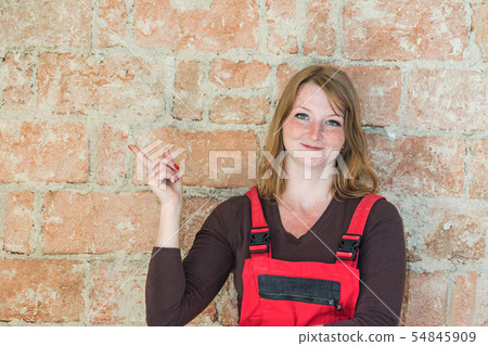 Young woman construction concept Young woman construction concept 54845909