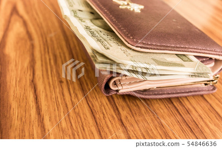 Indian Currency rupee cash note in leather wallet 54846636