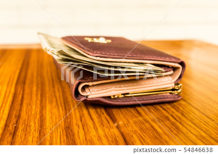 Indian Currency rupee cash note in leather wallet 54846638