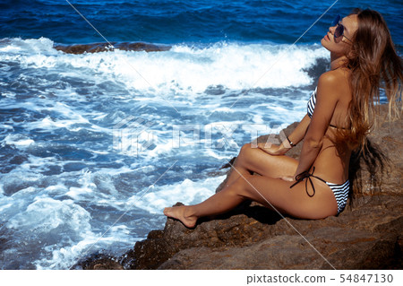sexual girl in the ocean posing 54847130