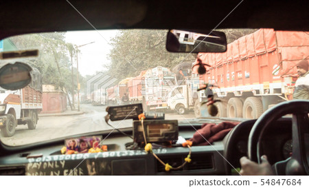 Hide Road, Kolkata, Car point of view inside out. Hide Road, Kolkata, Car point of view inside out. 54847684